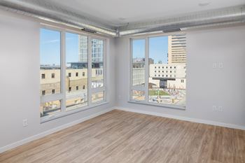 Large windows with view of cityscape at Kesler Apartments in Downtown Fargo, Fargo, North Dakota 58102